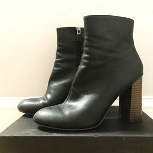 STUNT on em in these Black Heeled booties